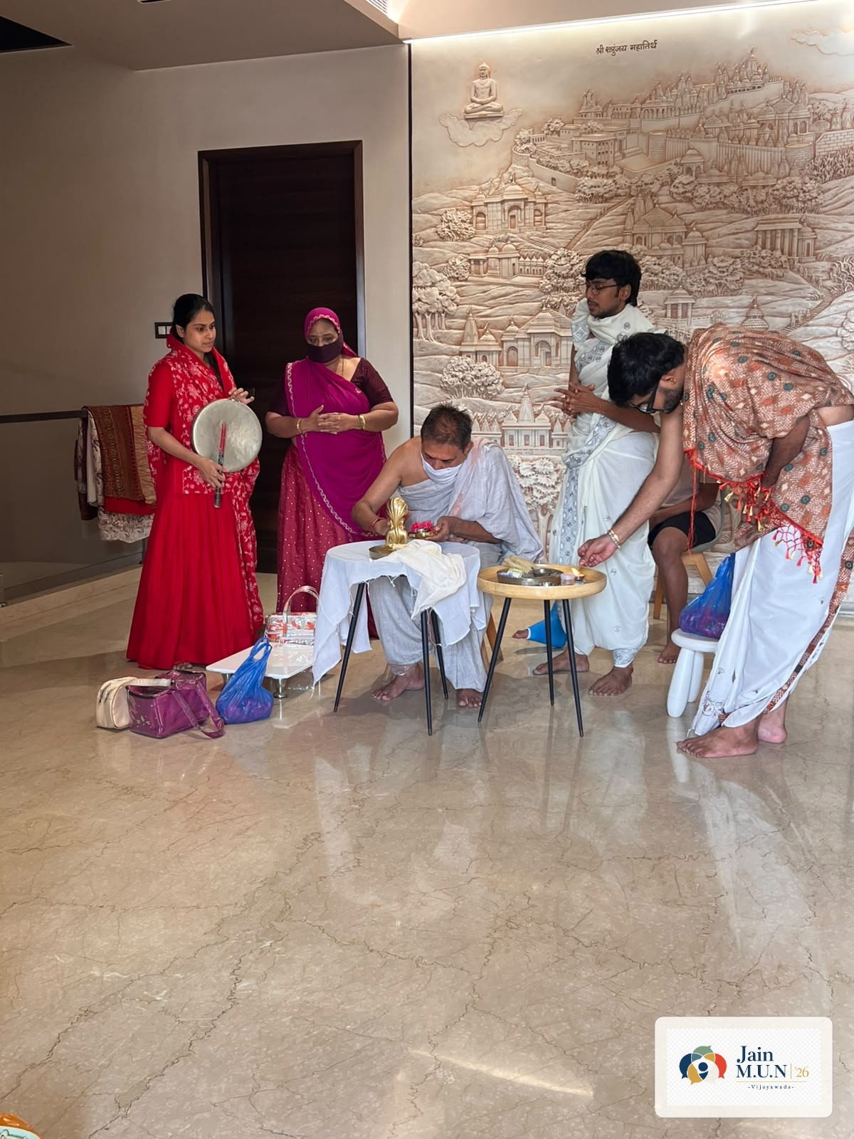 Puja performed with family members at home.